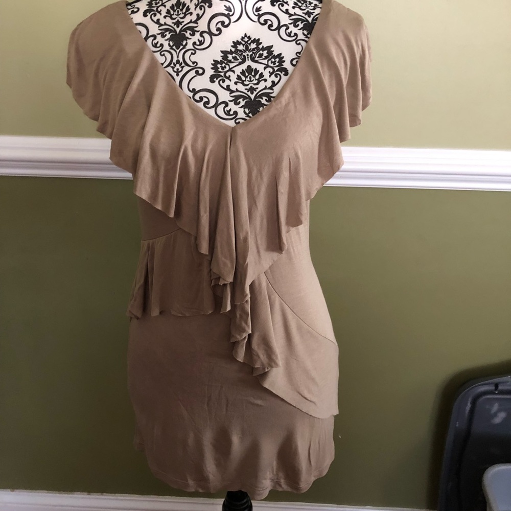 Brand new stylish top with back cutouts